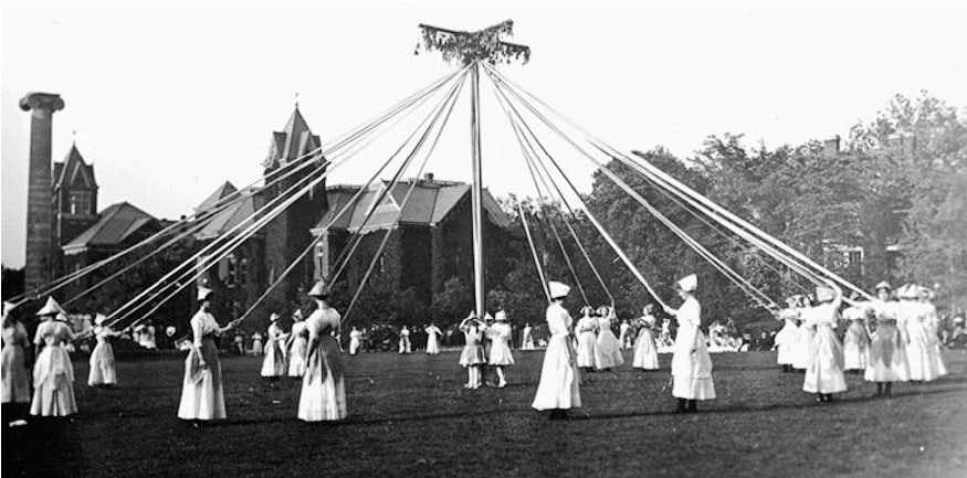 May Queen and her court around may pole on May Day