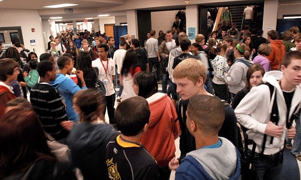 crowded high school hallway with kids