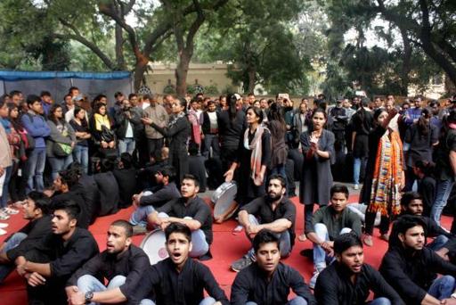 New Delhi: Members of Asmita Theatre group stage a street play during a demonstration to press for the rights of acid attack victims at Jantar Mantar in New Delhi, on Dec 12, 2014. (Photo: Sunil Majumdar/IANS)