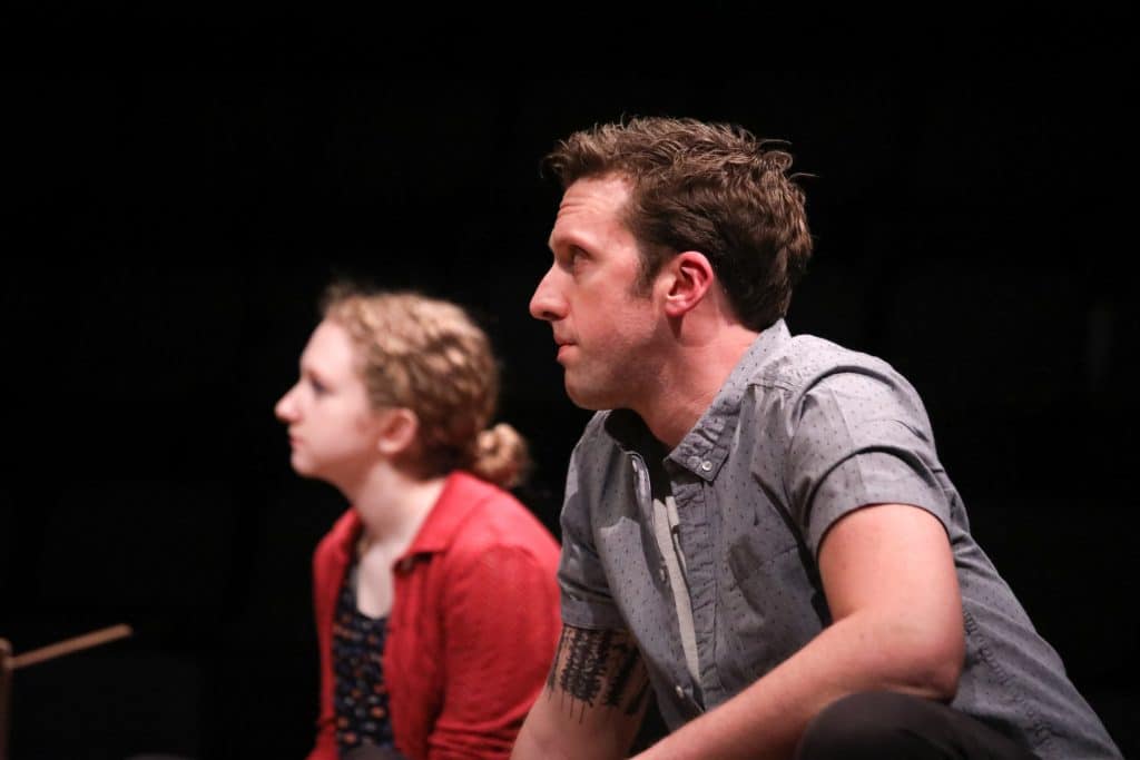 Greek Chorus, Gabriella Cila and Dan Toot listen attentively to Li'l Bit's story in 'How I Learned to Drive' at PlayMakers Repertory Company. (HuthPhoto)