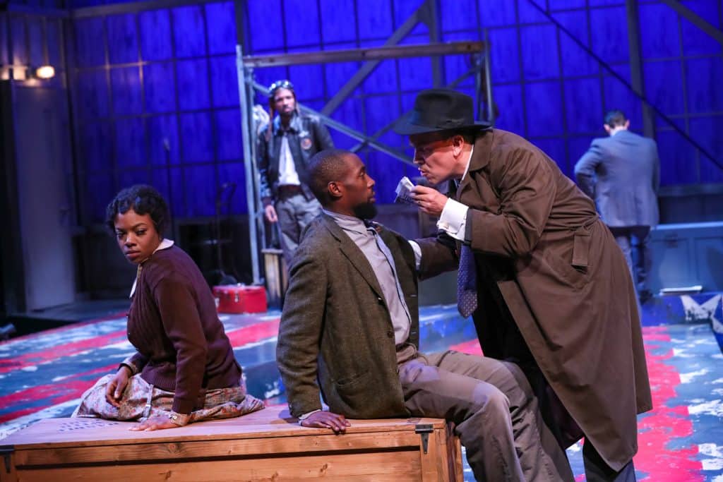 April Mae Davis as Bessie, Brandon Herman St. Clair Haynes as Bigger Thomas, and Daniel P. Wilson as Britten with Brandon Pierce as The Black Rat in Nambi E. Kelley’s “Native Son” at PlayMakers Repertory Company. (HuthPhoto)