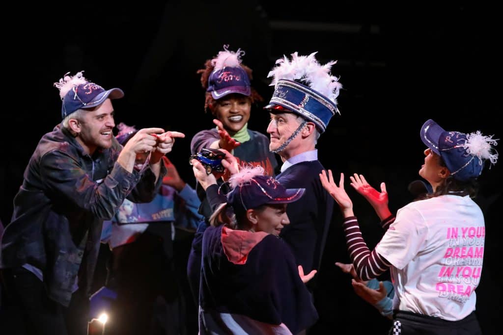 07_Ray Dooley as Henry Ford with members of the ensemble of RAGTIME at PlayMakers_Directed by Zi Alikhan_HuthPhoto